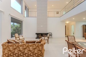 Casa em Condomínio à venda com 503m², 4 dormitórios, 4 suítes, 4 vagas, no bairro Terra Ville em PORTO ALEGRE
