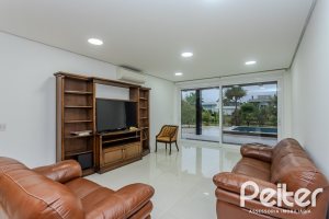 Casa em Condomínio à venda com 503m², 4 dormitórios, 4 suítes, 4 vagas, no bairro Terra Ville em PORTO ALEGRE