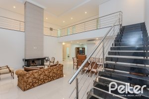 Casa em Condomínio à venda com 503m², 4 dormitórios, 4 suítes, 4 vagas, no bairro Terra Ville em PORTO ALEGRE