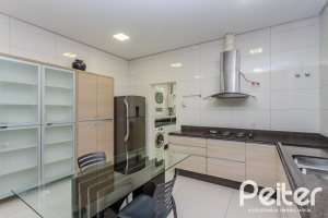 Casa em Condomínio à venda com 503m², 4 dormitórios, 4 suítes, 4 vagas, no bairro Terra Ville em PORTO ALEGRE
