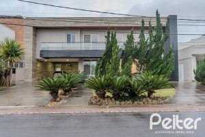 Casa em Condomínio à venda com 503m², 4 dormitórios, 4 suítes, 4 vagas, no bairro Terra Ville em PORTO ALEGRE