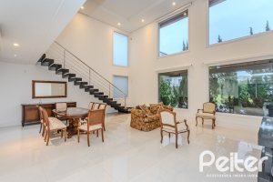 Casa em Condomínio à venda com 503m², 4 dormitórios, 4 suítes, 4 vagas, no bairro Terra Ville em PORTO ALEGRE