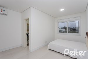 Casa em Condomínio à venda com 503m², 4 dormitórios, 4 suítes, 4 vagas, no bairro Terra Ville em PORTO ALEGRE