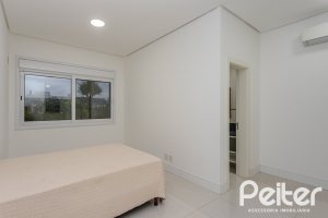 Casa em Condomínio à venda com 503m², 4 dormitórios, 4 suítes, 4 vagas, no bairro Terra Ville em PORTO ALEGRE