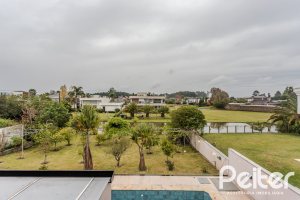 Casa em Condomínio à venda com 503m², 4 dormitórios, 4 suítes, 4 vagas, no bairro Terra Ville em PORTO ALEGRE