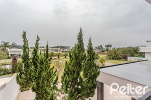 Casa em Condomínio à venda com 503m², 4 dormitórios, 4 suítes, 4 vagas, no bairro Terra Ville em PORTO ALEGRE