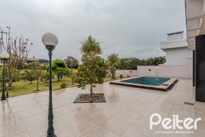 Casa em Condomínio à venda com 503m², 4 dormitórios, 4 suítes, 4 vagas, no bairro Terra Ville em PORTO ALEGRE