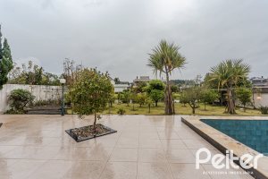 Casa em Condomínio à venda com 503m², 4 dormitórios, 4 suítes, 4 vagas, no bairro Terra Ville em PORTO ALEGRE