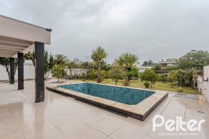 Casa em Condomínio à venda com 503m², 4 dormitórios, 4 suítes, 4 vagas, no bairro Terra Ville em PORTO ALEGRE