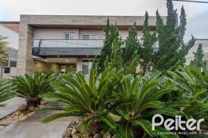 Casa em Condomínio à venda com 503m², 4 dormitórios, 4 suítes, 4 vagas, no bairro Terra Ville em PORTO ALEGRE