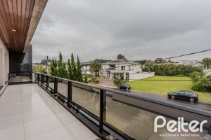 Casa em Condomínio à venda com 503m², 4 dormitórios, 4 suítes, 4 vagas, no bairro Terra Ville em PORTO ALEGRE
