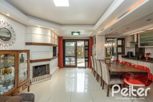 Casa em Condomínio à venda com 205m², 4 dormitórios, 2 suítes, 2 vagas, no bairro Ipanema em Porto Alegre