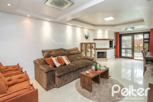 Casa em Condomínio à venda com 205m², 4 dormitórios, 2 suítes, 2 vagas, no bairro Ipanema em Porto Alegre