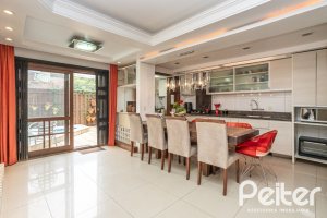 Casa em Condomínio à venda com 205m², 4 dormitórios, 2 suítes, 2 vagas, no bairro Ipanema em Porto Alegre