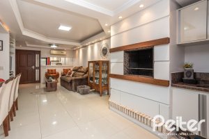 Casa em Condomínio à venda com 205m², 4 dormitórios, 2 suítes, 2 vagas, no bairro Ipanema em Porto Alegre