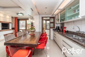 Casa em Condomínio à venda com 205m², 4 dormitórios, 2 suítes, 2 vagas, no bairro Ipanema em Porto Alegre