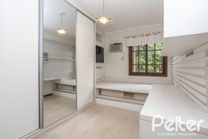 Casa em Condomínio à venda com 205m², 4 dormitórios, 2 suítes, 2 vagas, no bairro Ipanema em Porto Alegre