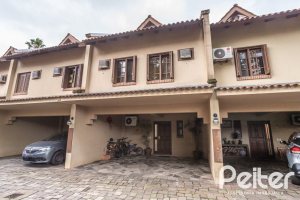 Casa em Condomínio à venda com 205m², 4 dormitórios, 2 suítes, 2 vagas, no bairro Ipanema em Porto Alegre