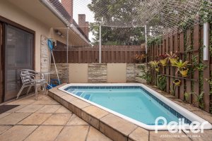 Casa em Condomínio à venda com 205m², 4 dormitórios, 2 suítes, 2 vagas, no bairro Ipanema em Porto Alegre