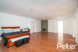 Casa à venda com 430m², 4 dormitórios, 3 suítes, 6 vagas, no bairro Vila Assunção em Porto Alegre