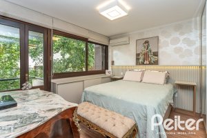 Casa em Condomínio à venda com 199m², 3 dormitórios, 3 suítes, 2 vagas, no bairro Vila Assunção em Porto Alegre