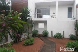 Casa à venda com 287m², 3 dormitórios, 3 suítes, 2 vagas, no bairro Ipanema em Porto Alegre