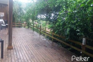 Casa à venda com 287m², 3 dormitórios, 3 suítes, 2 vagas, no bairro Ipanema em Porto Alegre