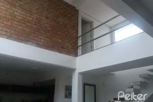 Casa à venda com 287m², 3 dormitórios, 3 suítes, 2 vagas, no bairro Ipanema em Porto Alegre
