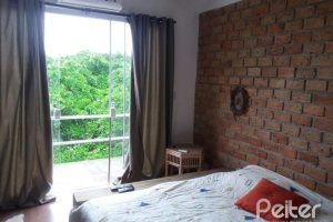 Casa à venda com 287m², 3 dormitórios, 3 suítes, 2 vagas, no bairro Ipanema em Porto Alegre