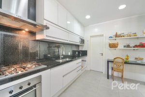 Casa em Condomínio à venda com 535m², 4 dormitórios, 4 suítes, 4 vagas, no bairro Terra Ville em PORTO ALEGRE
