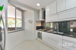Casa em Condomínio à venda com 535m², 4 dormitórios, 4 suítes, 4 vagas, no bairro Terra Ville em PORTO ALEGRE
