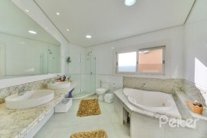 Casa em Condomínio à venda com 535m², 4 dormitórios, 4 suítes, 4 vagas, no bairro Terra Ville em PORTO ALEGRE