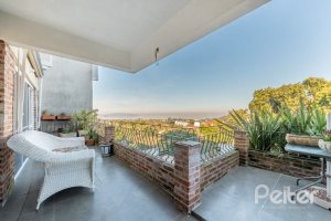 Casa à venda com 449m², 4 dormitórios, 4 suítes, 4 vagas, no bairro Jardim Isabel em Porto Alegre