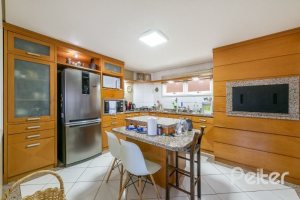 Casa à venda com 449m², 4 dormitórios, 4 suítes, 4 vagas, no bairro Jardim Isabel em Porto Alegre