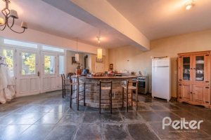 Casa à venda com 449m², 4 dormitórios, 4 suítes, 4 vagas, no bairro Jardim Isabel em Porto Alegre