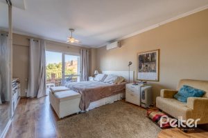 Casa à venda com 449m², 4 dormitórios, 4 suítes, 4 vagas, no bairro Jardim Isabel em Porto Alegre