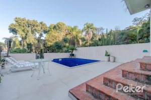 Casa à venda com 449m², 4 dormitórios, 4 suítes, 4 vagas, no bairro Jardim Isabel em Porto Alegre