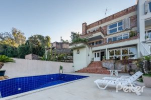 Casa à venda com 449m², 4 dormitórios, 4 suítes, 4 vagas, no bairro Jardim Isabel em Porto Alegre