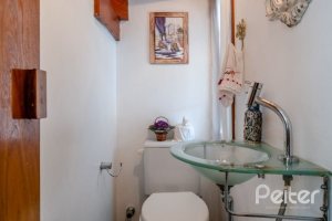 Casa em Condomínio à venda com 233m², 3 dormitórios, 1 suíte, 2 vagas, no bairro Tristeza em Porto Alegre