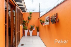 Casa em Condomínio à venda com 233m², 3 dormitórios, 1 suíte, 2 vagas, no bairro Tristeza em Porto Alegre