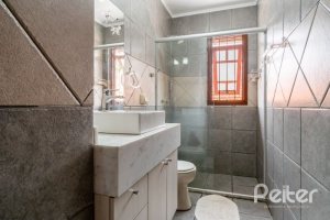 Casa em Condomínio à venda com 233m², 3 dormitórios, 1 suíte, 2 vagas, no bairro Tristeza em Porto Alegre