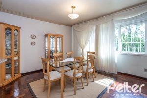 Casa em Condomínio à venda com 198m², 3 dormitórios, 1 suíte, 6 vagas, no bairro Tristeza em Porto Alegre