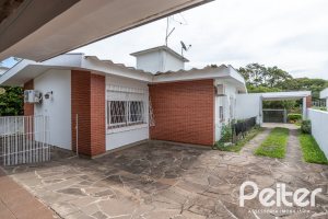 Casa em Condomínio à venda com 198m², 3 dormitórios, 1 suíte, 6 vagas, no bairro Tristeza em Porto Alegre