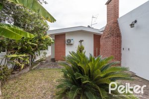 Casa em Condomínio à venda com 198m², 3 dormitórios, 1 suíte, 6 vagas, no bairro Tristeza em Porto Alegre