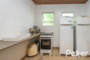 Casa em Condomínio à venda com 198m², 3 dormitórios, 1 suíte, 6 vagas, no bairro Tristeza em Porto Alegre