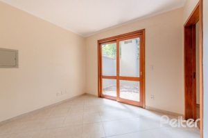 Casa em Condomínio à venda com 255m², 4 dormitórios, 2 suítes, 4 vagas, no bairro Vila Assunção em Porto Alegre