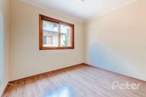 Casa em Condomínio à venda com 255m², 4 dormitórios, 2 suítes, 4 vagas, no bairro Vila Assunção em Porto Alegre