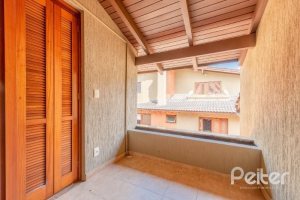 Casa em Condomínio à venda com 255m², 4 dormitórios, 2 suítes, 4 vagas, no bairro Vila Assunção em Porto Alegre