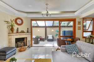 Casa em Condomínio à venda com 347m², 3 dormitórios, 1 suíte, 3 vagas, no bairro Jardim Isabel em Porto Alegre