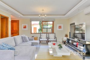 Casa em Condomínio à venda com 347m², 3 dormitórios, 1 suíte, 3 vagas, no bairro Jardim Isabel em Porto Alegre